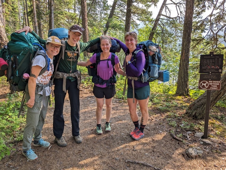 The pika crew (Lexie, Jessalyn, Dani, and Maloree, L-R) embarking on an 8-day backcountry trip to look for pikas in Glacier National Park, Montana.