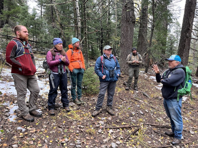 Jack Williams lectures a captive audience of Mexican spotted owl biologists on the Lincoln National Forest, New Mexico.