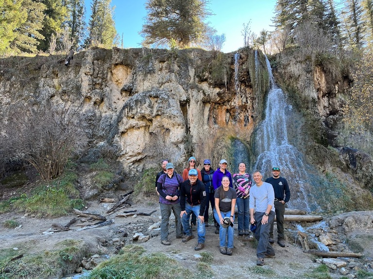Posing by a waterfall during a field trip to the Lincoln National Forest, New Mexico.