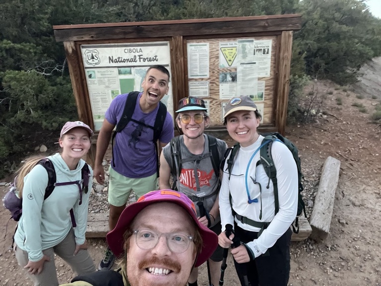 Exhausted but cheerful hikers after a long day traversing the Sandia Crest trail on the Cibola National Forest!