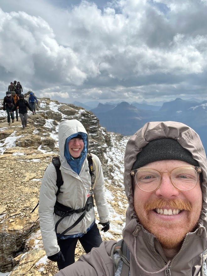 Jessalyn and Gavin lead a descent from the summit of Mt. Reynolds in Glacier National Park, MT.